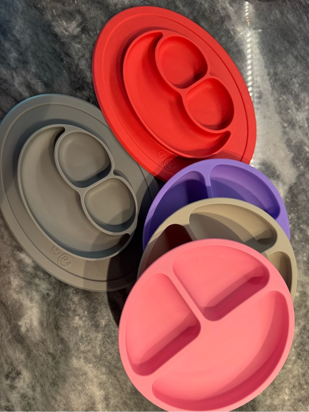 Silicon toddler plates. 2 ezpz Happy Mat + 3 WeeSprout plates Like new condition